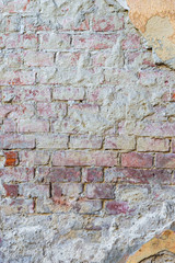 background texture old brick wall with remnants of plasters