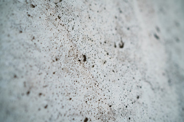 angle shot of new concrete wall with shallow focus