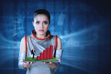 Futuristic woman showing a successful businessman