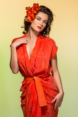 Fototapeta premium beautiful girl in orange dress