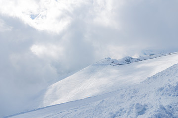 Fototapeta na wymiar Clouds in the mountains of Sochi