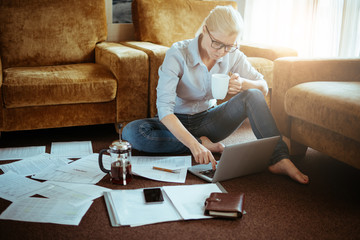 A woman in normal clothes working at home. Startup of the project.