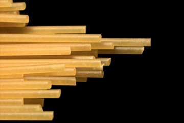 Pasta spaghetti macro isolated on a black background