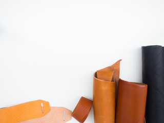 material from black brown and light brown leather and leather after press process with white isolated background
