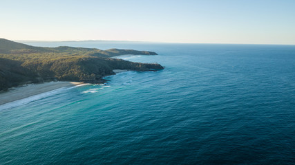 Fototapeta na wymiar Drone shot of the coastline of sunshine beach towards Coolum at sunset.