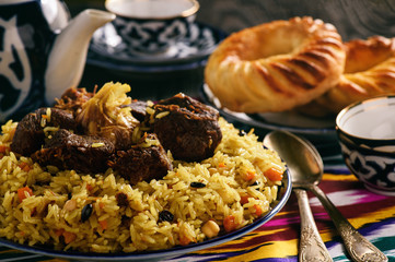 Pilaf- traditional asian dish, rice prepared with vegetables and meat. Oriental, uzbek style.