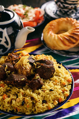 Pilaf- traditional asian dish, rice prepared with vegetables and meat. Oriental, uzbek style.