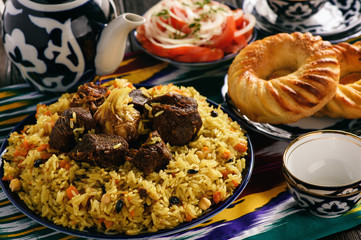 Pilaf- traditional asian dish, rice prepared with vegetables and meat. Oriental, uzbek style.