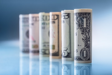 Dollar. American dollar banknotes rolled in different positions