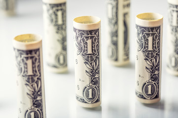Dollar. American dollar banknotes rolled in different positions