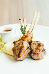 Grilled rack of lamb meat with sauce