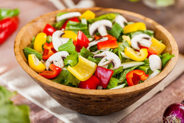 vegetable salad bowl on kitchen table, balanced diet