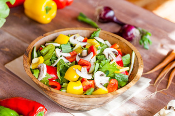vegetable salad bowl on kitchen table, balanced diet