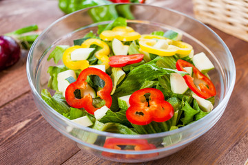 vegetable salad bowl on kitchen table, balanced diet