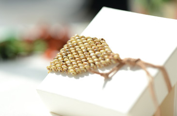 Handmade beaded bracelet with leather closure close up