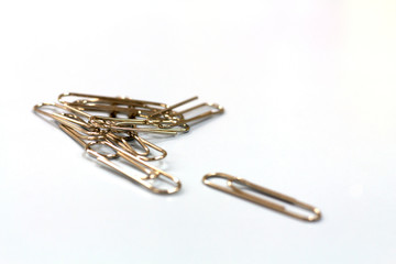 Paper clip on the floor.