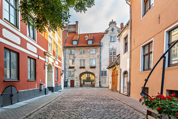 Oldest medieval buildings in Riga – famous Baltic city where tourists can find unique architectural Gothic ensembles and rare ancient buildings, - obrazy, fototapety, plakaty