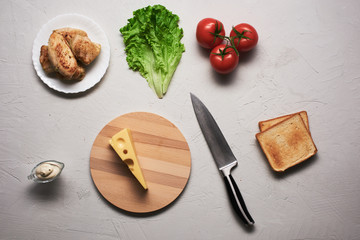 Multiple ingredients combined into a chicken sandwich