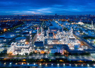 Obraz na płótnie Canvas Aerial view of twilight of oil refinery ,Shot from drone of Oil refinery and Petrochemical plant at dusk , Bangkok, Thailand