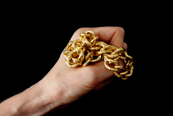 golden chain in hand
