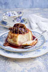 Traditonal cheesecake with plum and pecan nut on plate