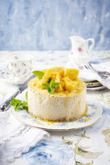 Traditional English lemon cheesecake as close-up on a Plate