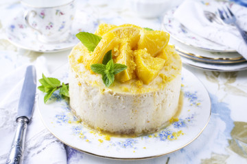 FTraditional English lemon cheesecake on plate