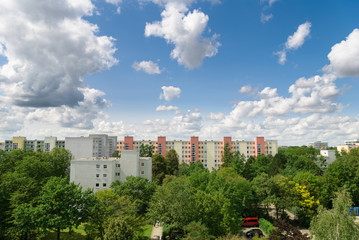 Nice view of buildings, trees and cloudy sky in Munich - Neuperlach