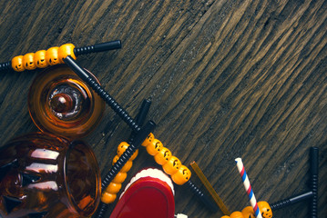halloween party with prop decor on wood ground