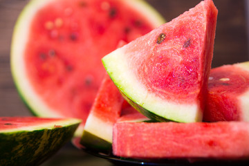 Fresh and juicy watermelon on the plate. Ripe watermelon to the delight of children