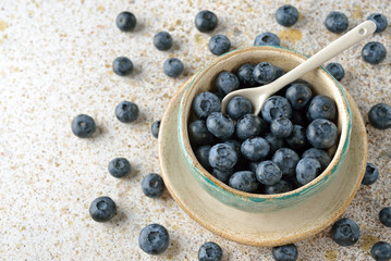 Fresh organic blueberries in a bowl