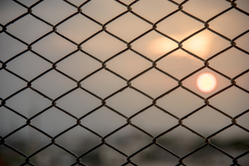 Fototapeta premium Steel grating sunset background.