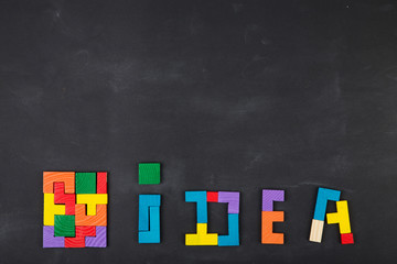 Business creative solution concept jigsaw on the blackboard
