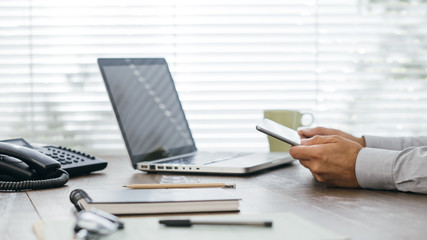 Fototapeta premium Businessman working at office desk