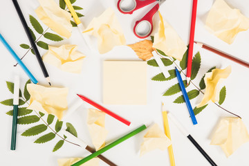 Office and student accessories on a white. Supplies on white background,  top view. Back to school concept. Copy space