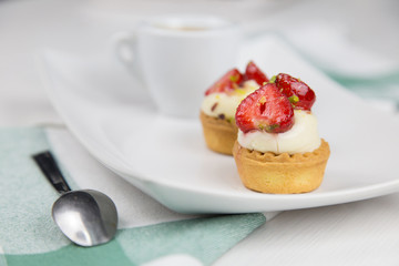 Sicilian pastry and coffee on white dish