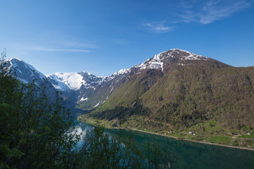 Fototapeta na wymiar View of Esefjorden and the surrounding snow covered peaks