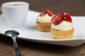 Sicilian pastry and coffee on white dish