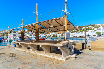 Market stand which is used to present and sell fresh fish in Mykonos port, Cyclades, Greece
