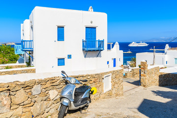 Typical white Greek house with blue windows in beautiful Mykonos town, Cyclades islands, Greece