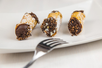 Sicilian pastry on white rectangular dish
