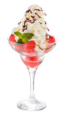 Balls of watermelon in a glass Cremant with whipped cream and topping. Isolated on white.