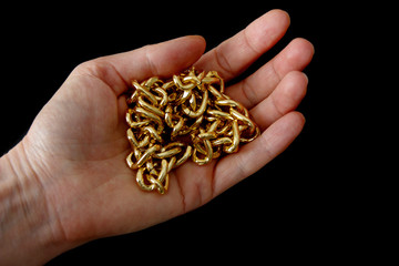 golden chain in hand