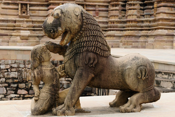 Fototapeta na wymiar India, Sculptures religious erotic sybmboli of the Indian faith on walls of temples in Khujaraho temples. Madhya Pradesh