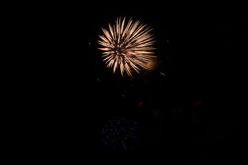 Colorful fireworks at night sky - party celebration concept
