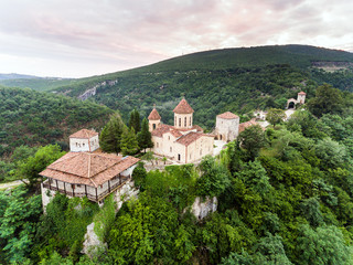 AERIAL. Old monastery hiding in the forests, also known as Motsameta, Georgia