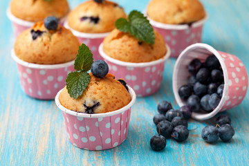 blueberry muffins in pink cases