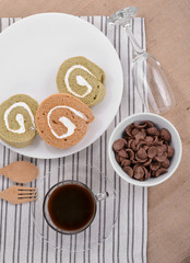 Jam roll with coffee