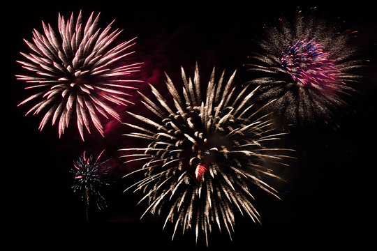 Colorful fireworks at night sky - party celebration concept - fireworks  on black background