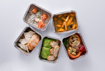 Healthy food take away in boxes on white background